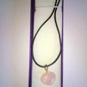 A beautiful Rose Quartz Gemstone Heart Shaped Pendant On A Cord Necklace